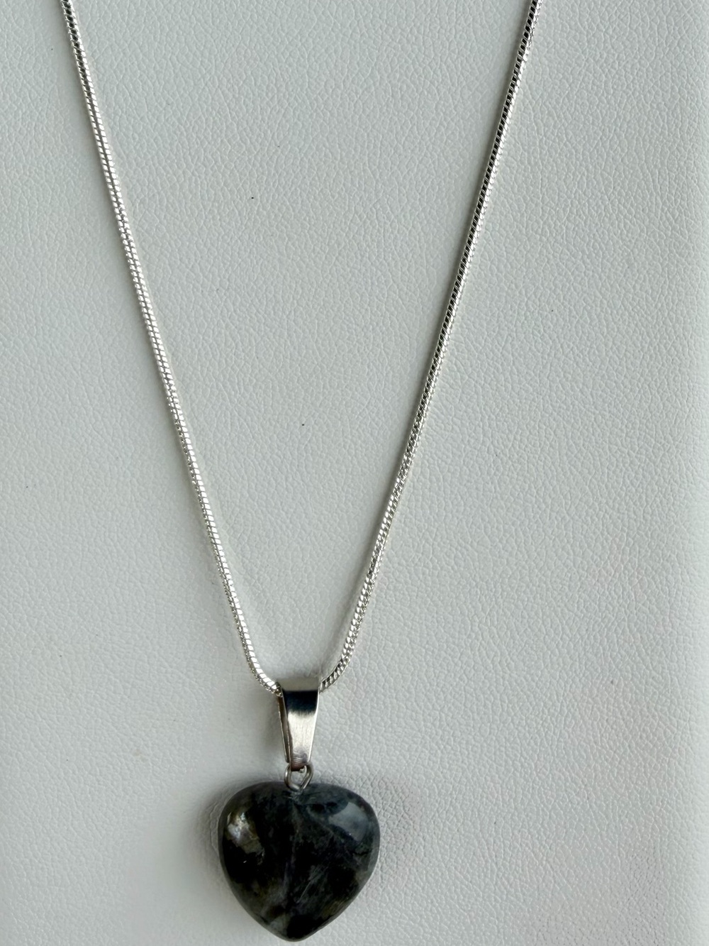 Heart-Shaped Dark Stone Pendant Necklace in Black and Silver